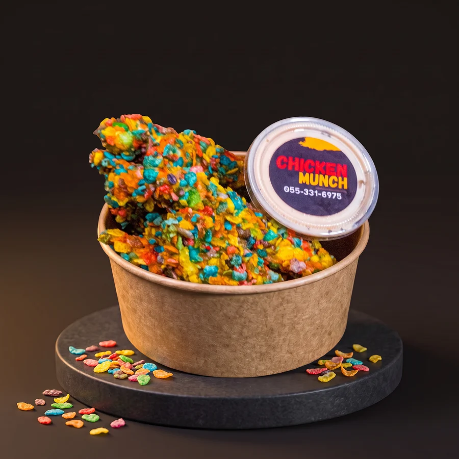 Fruity Chicken, coated in Fruity Pebbles, in a kraft bowl