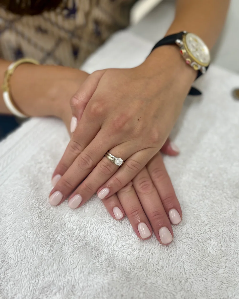 Soft nude gel nails on a client