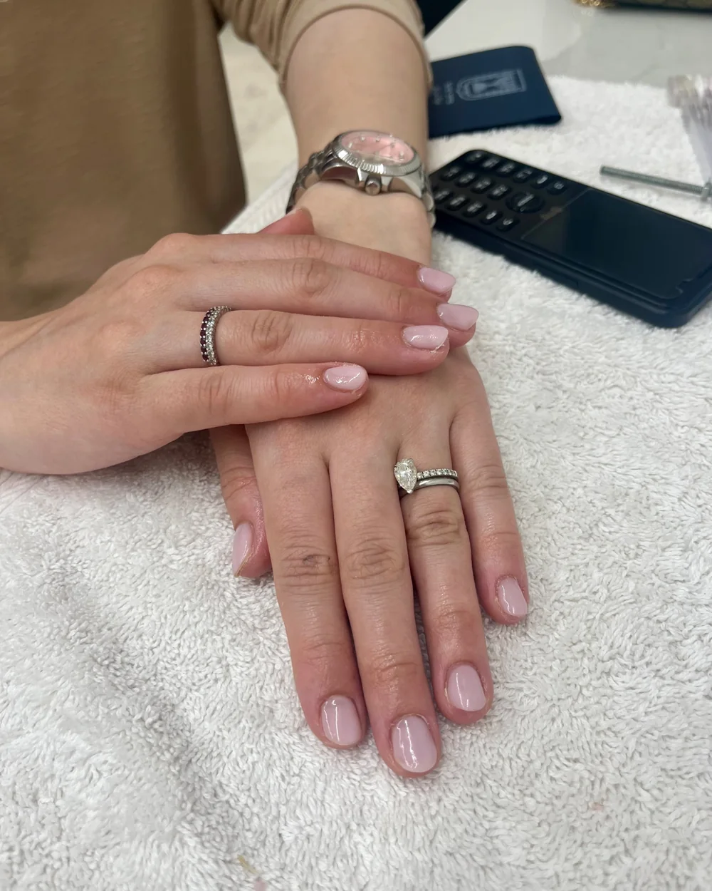 Pale pink gel nails on a client